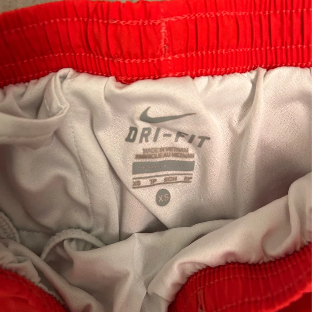 Girls orange-y Nike dry fit shorts XS